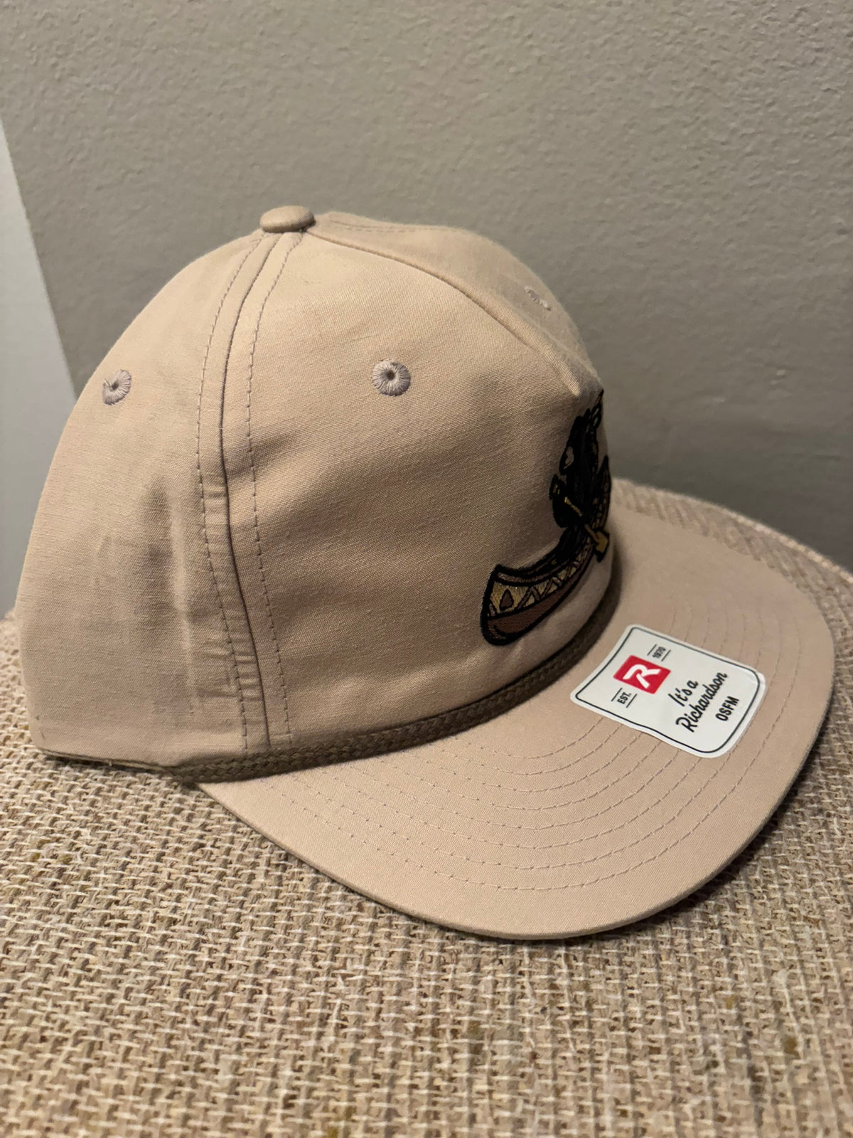 Grizzly Greens tan rope golf hat angled view